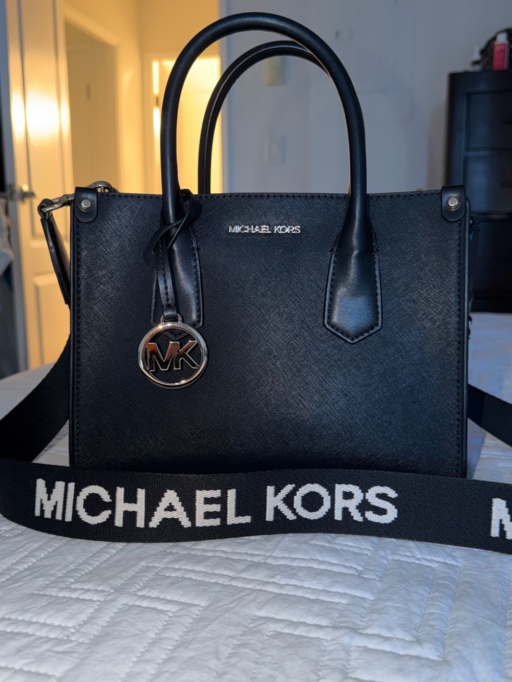 Michael Kors Black Saffiano Satchel with MK Logo Charm and Branded Strap